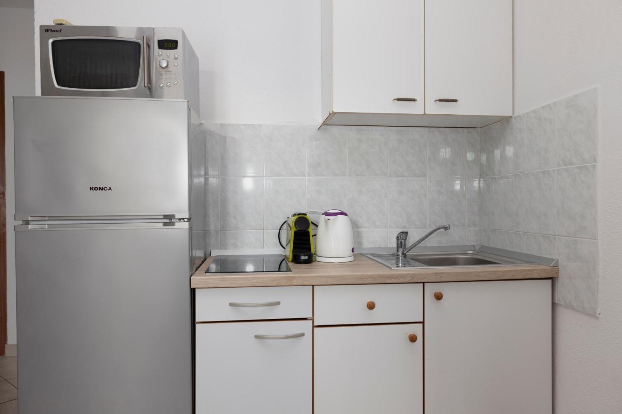Apartments Family Roso Проманья Экстерьер фото